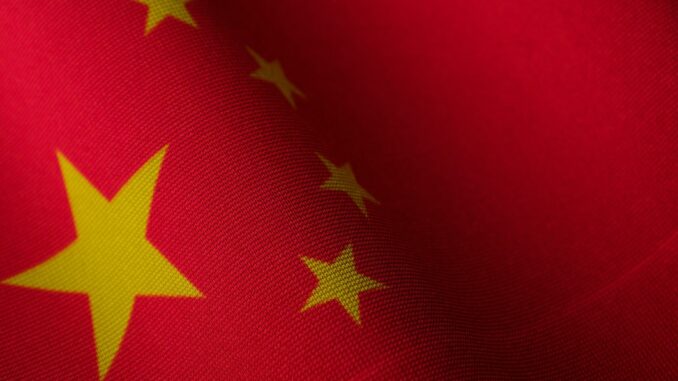 Flag of China as leading AI chatbots including OpenAI's ChatGPT, Microsoft's Copilot, Google's Gemini, DeepSeek's R1, and xAI's Grok are caught reproducing Chinese Communist Party (CCP) propaganda and censorship when questioned on sensitive topics.