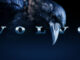 A raven stands over the word VOLVO